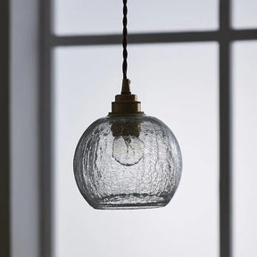 GlobeGlow - Modern pendant lamp with sleek globe design and elegant lighting