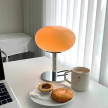 RadiantGlow - Sleek Table Lamp with Rounded Glass Shade