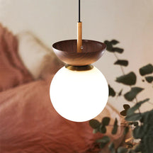 LumiGlow - Elegant pendant lamp with intricate design and warm glow