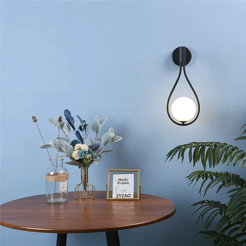 LumaDrop - Elegant Teardrop Shaped Wall Sconce with Frosted Glass Globe