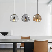 Auristra - Elegant pendant lamp with modern design and warm ambient glow