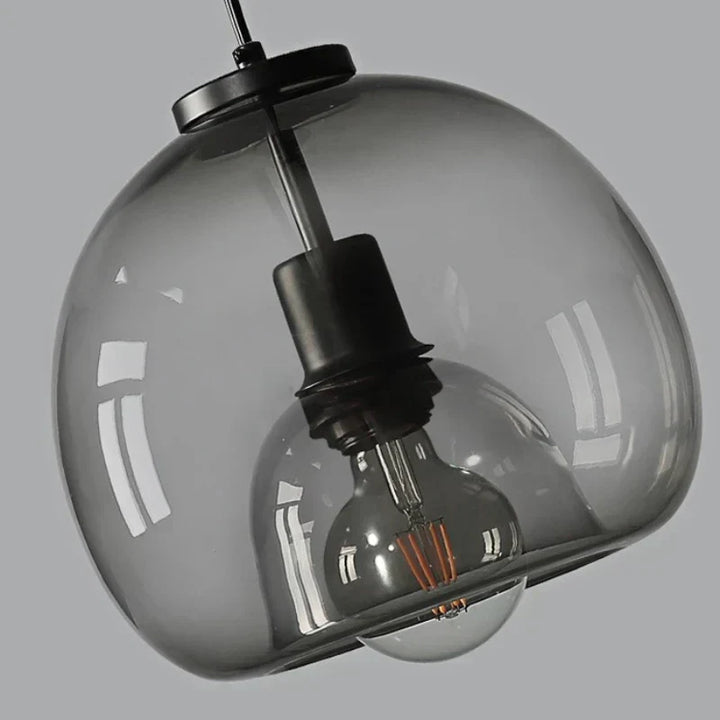 Auristra - Elegant pendant lamp with modern design and warm ambient glow