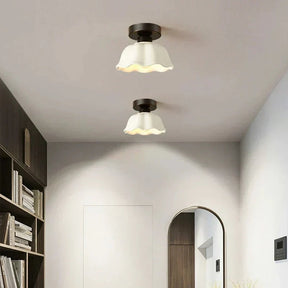 LumiWave - Elegant ceiling light with wavy shade and soft ambient glow