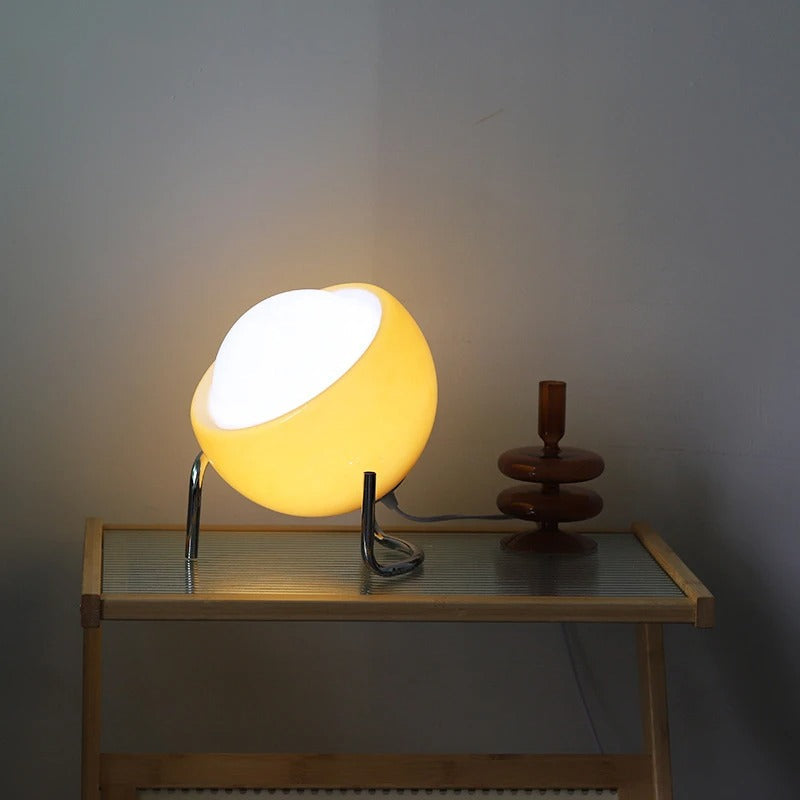 VivaGlow - Playful Table Lamp with Spherical Shade and Curved Base